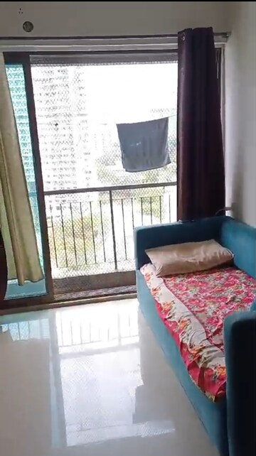 Living Room in 1.5 BHK Apartment at Man Opus, Mira Road – for Sale