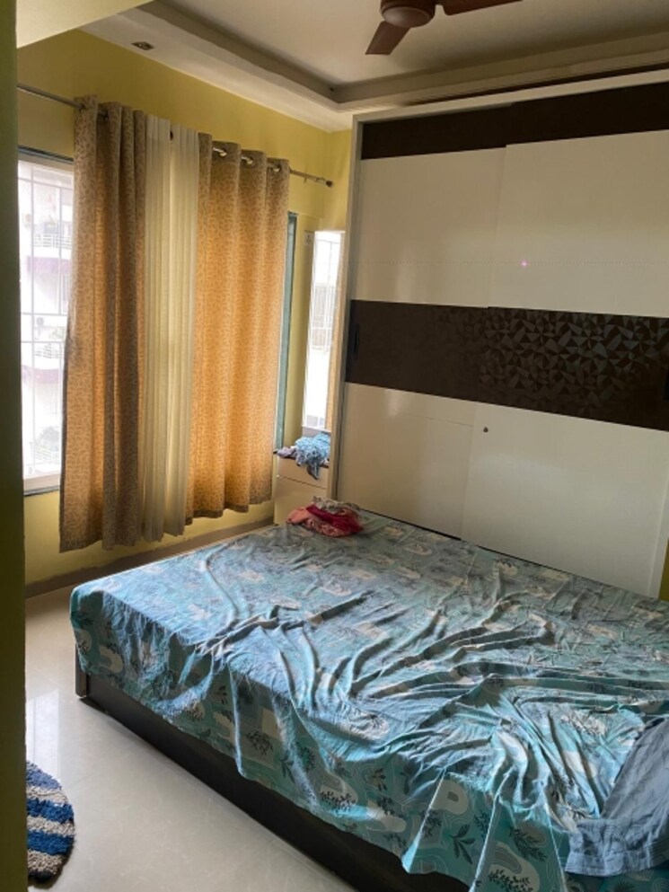 Bedroom, greenland-society 2 Bedroom 900 Sq.Ft. Apartment In Pimple Saudagar Pune 7496404