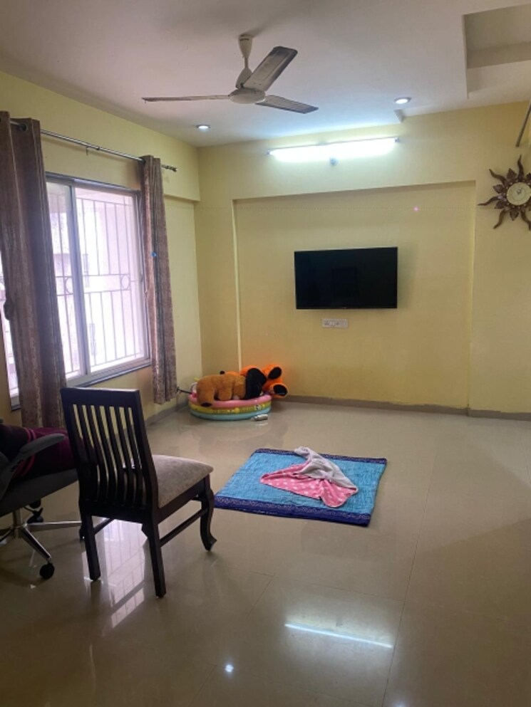 Living Room, greenland-society 2 Bedroom 900 Sq.Ft. Apartment In Pimple Saudagar Pune 7496404