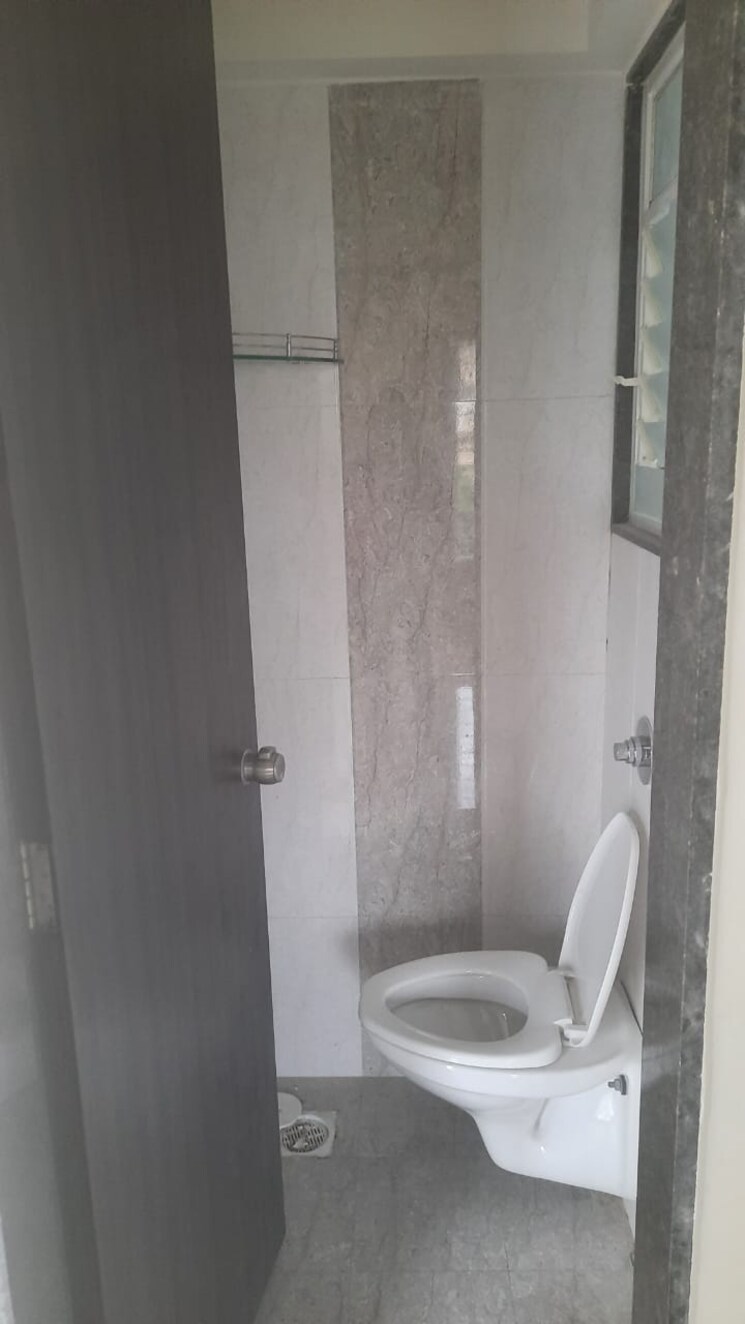 Bathroom, vertical-alcinia 2 Bedroom 724 Sq.Ft. Apartment In Mohammadwadi Pune 7496413