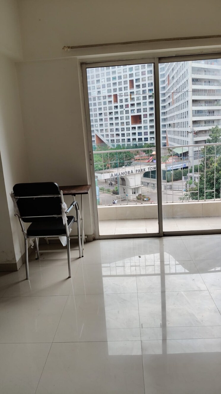 Living Room, amanora-metro-tower 1 Bedroom 680 Sq.Ft. Apartment In Hadapsar Pune 7496621