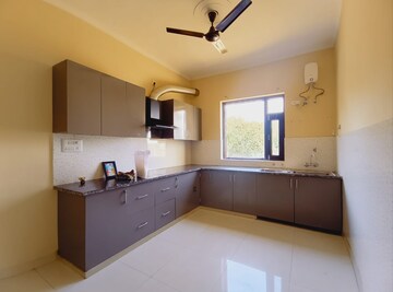 Kitchen in 4 BHK Apartment at Emaar The Enclave, Sector 66 – for Sale