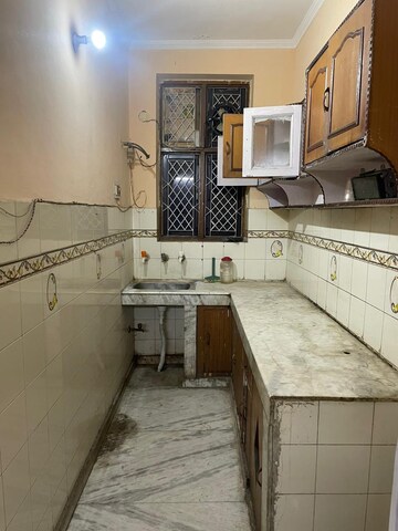 Kitchen in 2 BHK Builder Floor at Spring Field Colony – for Sale