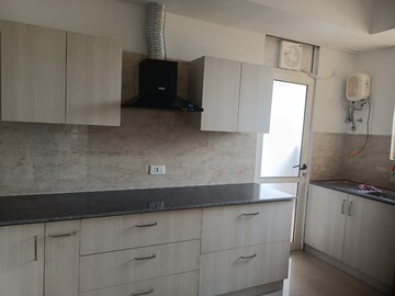 Kitchen in 3 BHK Apartment at Jaypee Greens Kalypso Court, Sector 128 – for Rent