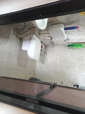 Bathroom in 1 BHK Apartment at Raunak Heights, Ghodbunder Road – for Sale