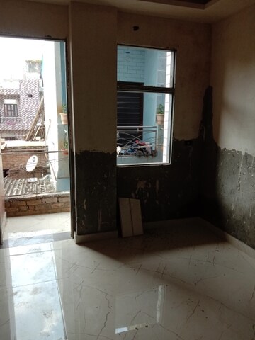 Living Room in 1.5 BHK Builder Floor at Dwarka Mor – for Sale
