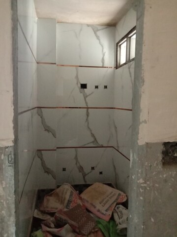 Bathroom in 1.5 BHK Builder Floor at Dwarka Mor – for Sale