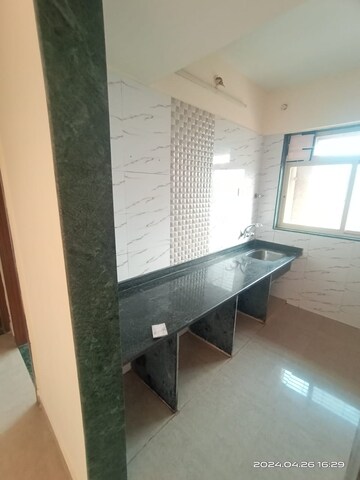 Kitchen in 2 BHK Apartment at Mohan Willows, Badlapur East – for Sale