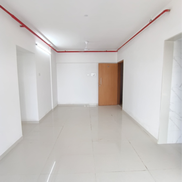 Living Room in 2.5 BHK Apartment at Romell Serene, Ic Colony – for Sale