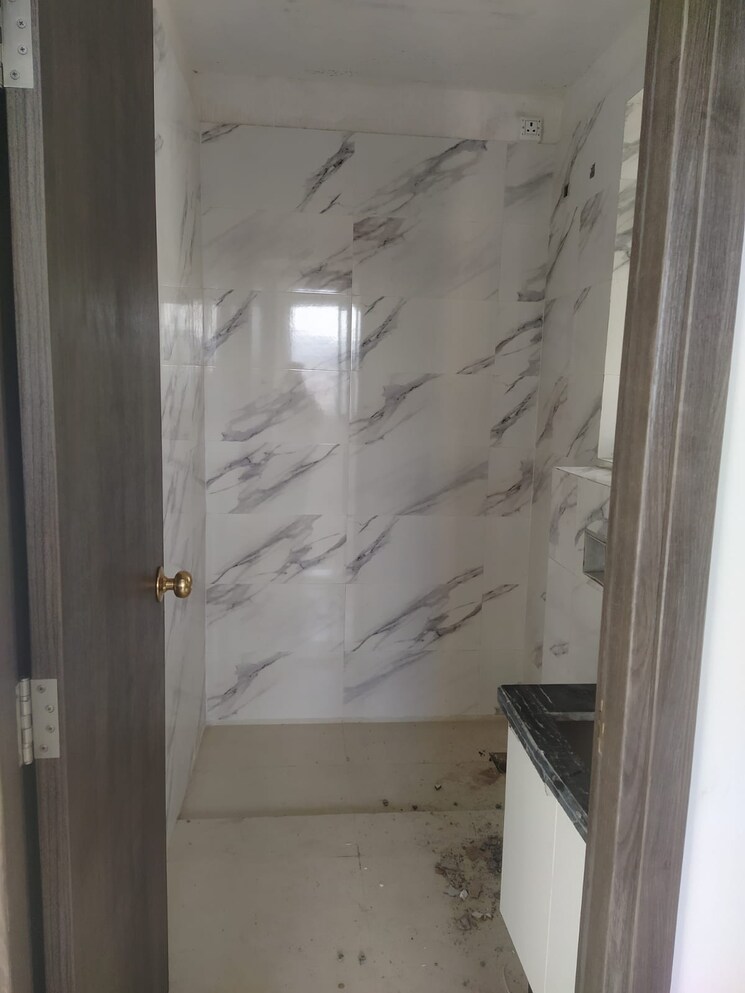 Bathroom, risland-the-icon 2 Bedroom 671 Sq.Ft. Apartment In Dhokali Thane 7503150