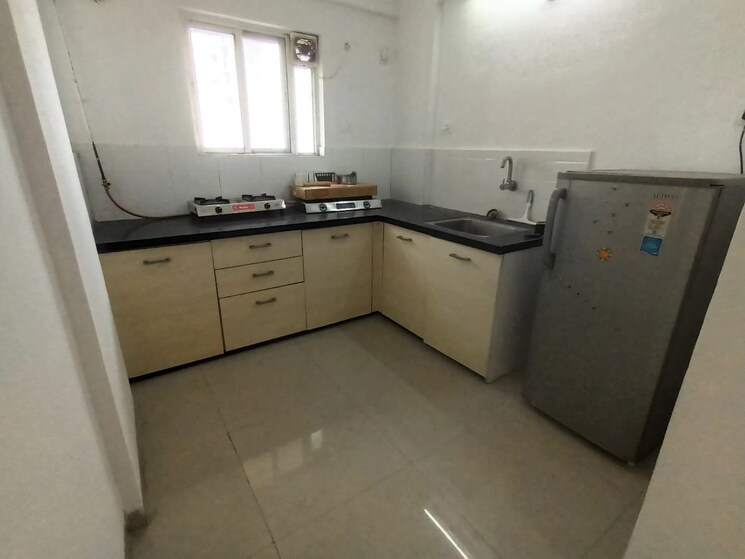 Kitchen, magarpatta-city-heliconia 1 Bedroom 650 Sq.Ft. Apartment In Hadapsar Pune 7503238