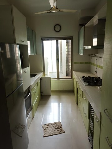 Kitchen in 2.5 BHK Builder Floor at Oberoi Realty Woods, Goregaon East – for Sale