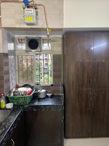 Kitchen in 1 BHK Apartment at Parsik Nagar – for Sale