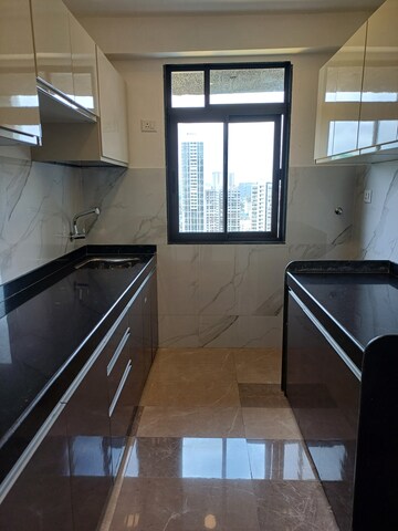 Kitchen in 2 BHK Apartment at Dev Leo Tower, Oshiwara – for Sale
