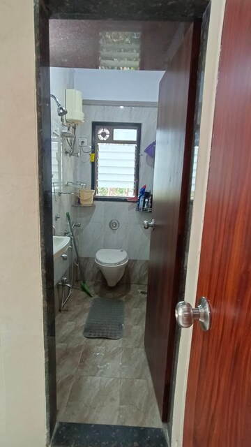 Bathroom in 2 BHK Apartment at Sri Badrinath CHS, Dahisar East – for Sale
