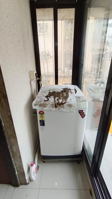 Balcony in 2 BHK Apartment at Sri Badrinath CHS, Dahisar East – for Sale