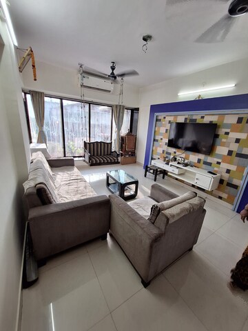 Living Room in 2 BHK Apartment at Sri Badrinath CHS, Dahisar East – for Sale