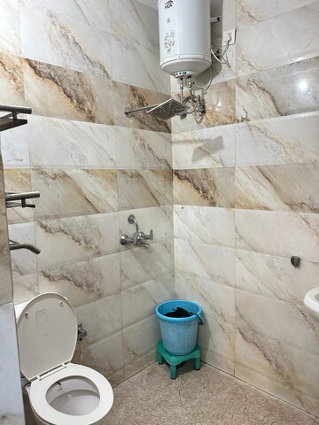Bathroom in 3 BHK Apartment at Guru Nanak Enclave, Dhakoli Village – for Sale