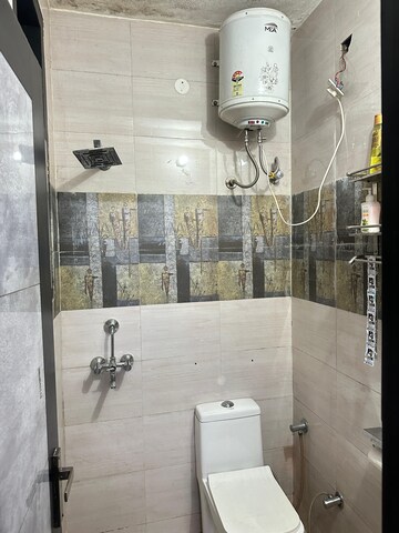 Bathroom in 3 BHK Apartment at Guru Nanak Enclave, Dhakoli Village – for Sale