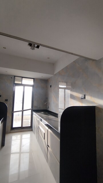 Kitchen in 2 BHK Apartment at Vikas Ritz, Khadakpada – for Sale