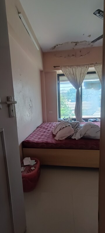 Bedroom in 2 BHK Apartment at Mahindra Park, Ghatkopar West – for Sale