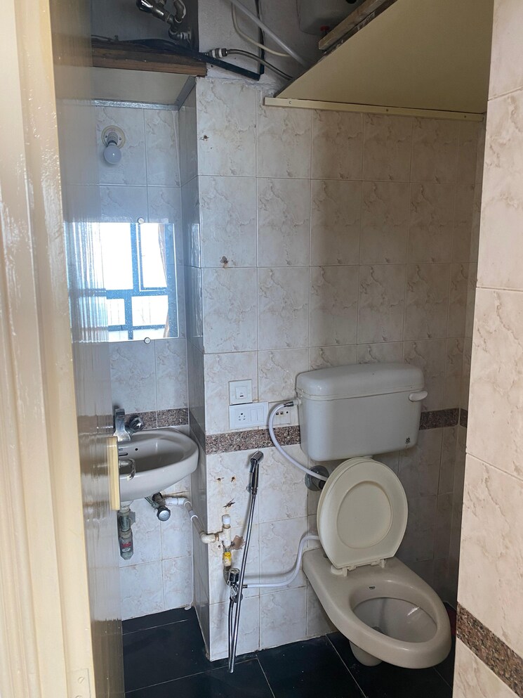 Bathroom, royal-palms-garden-view 1 Bedroom 710 Sq.Ft. Apartment In Goregaon East Mumbai 7505763