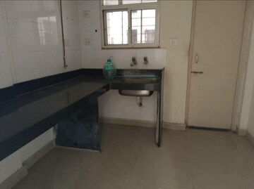 Kitchen in 1.5 BHK Apartment at Goel Sai Ganga, Undri – for Sale
