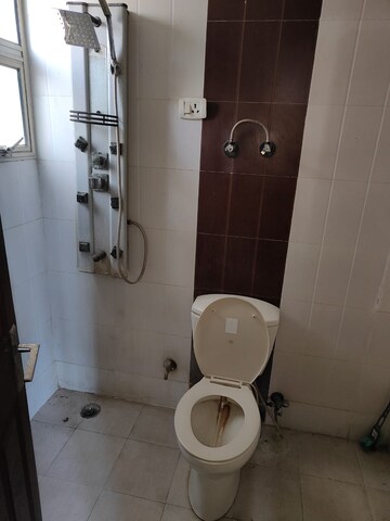 Bathroom in 3 BHK Apartment at Kingswood Court, Sain Vihar – for Sale