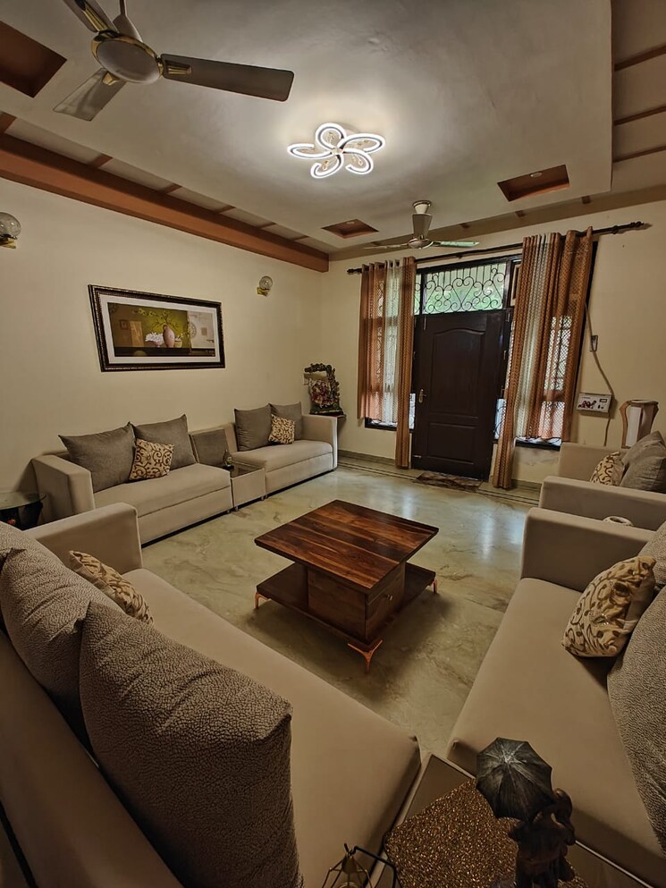 Living Room, gaurs-global-village 2 Bedroom 976 Sq.Ft. Apartment In Sain Vihar Ghaziabad 7507489