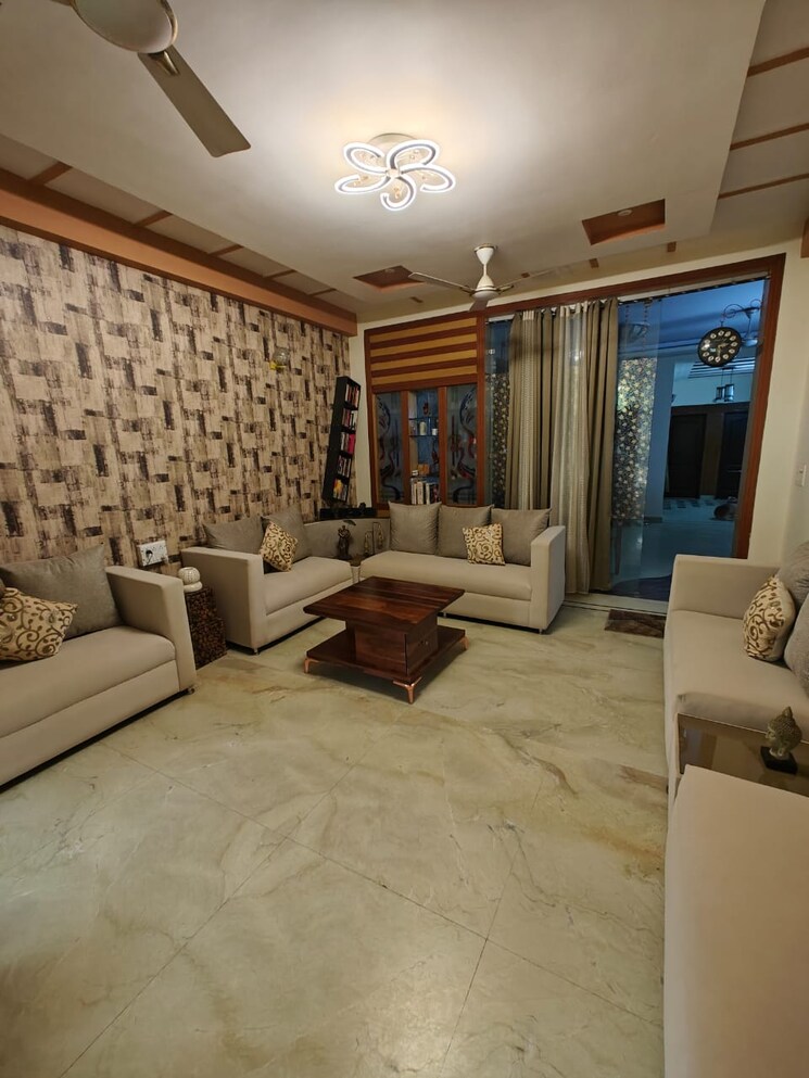 Living Room, gaurs-global-village 2 Bedroom 976 Sq.Ft. Apartment In Sain Vihar Ghaziabad 7507489