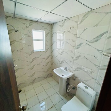 Bathroom in 3 BHK Apartment at SKA Divya Towers, Panchsheel Green – for Sale