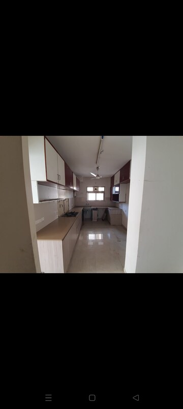 Kitchen in 3 BHK Apartment at Hiranandani Estate Rodas Enclave, Ghodbunder Road – for Sale