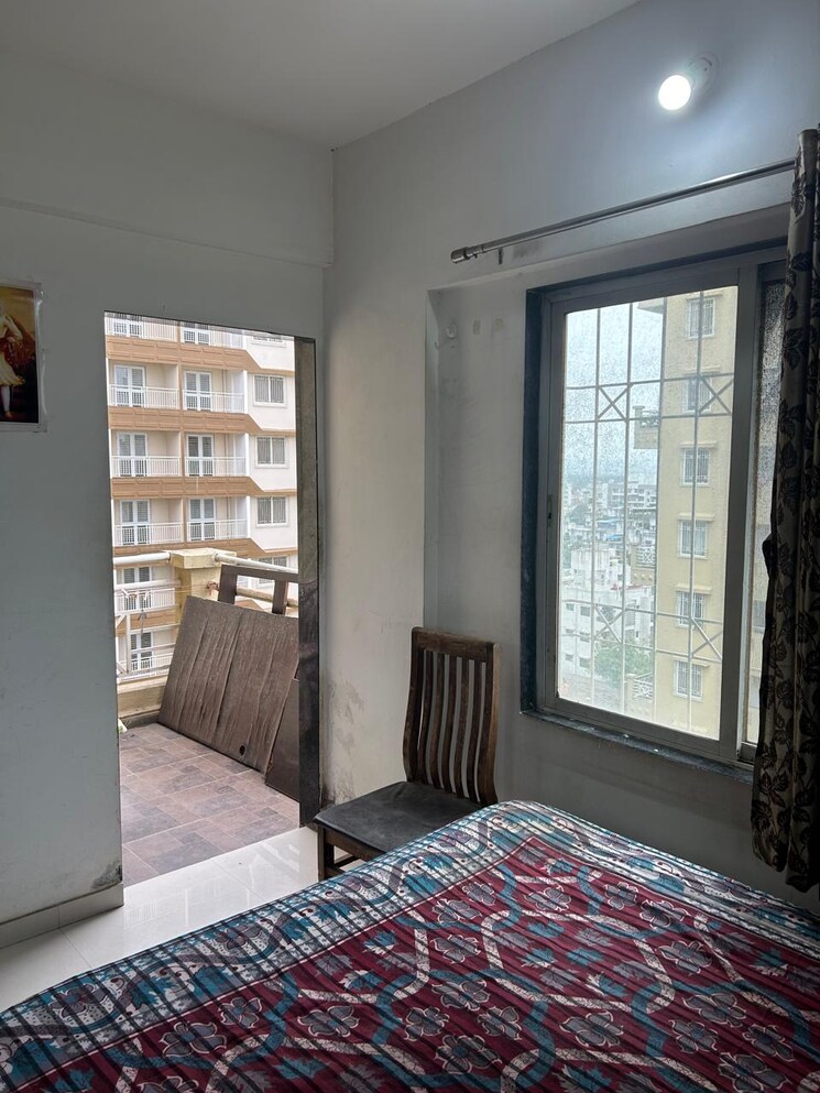 Bedroom, param-kesar-kingdom-a-bld 2 Bedroom 720 Sq.Ft. Apartment In Dighi Pune 7508188