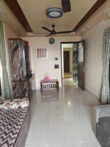 Living Room in 1 BHK Apartment at Saidham CHS, Seawoods – for Sale