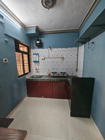 Kitchen in 2 BHK Apartment at Krishnakamal CHS, Nerul Sector 21 – for Sale