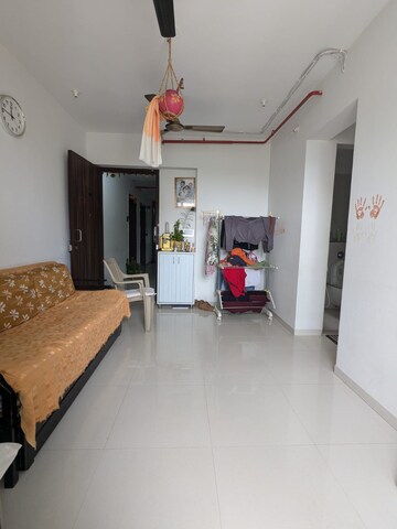 Living Room in 1 BHK Apartment at Ashar Aria, Kalwa – for Sale