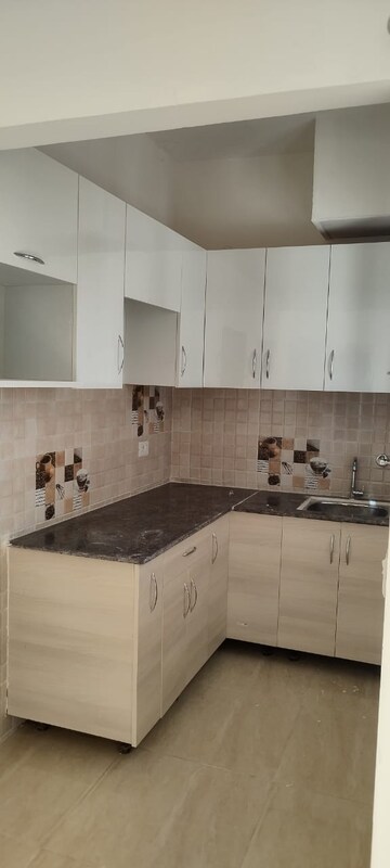 Kitchen in 2 BHK Apartment at Divyansh Flora, Sector 16c Greater Noida – for Sale