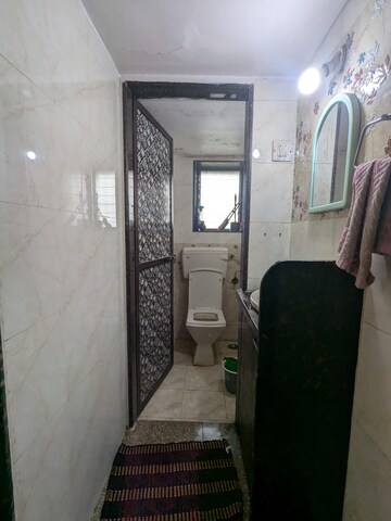Living Room in 1 BHK Apartment at Kharigaon – for Sale