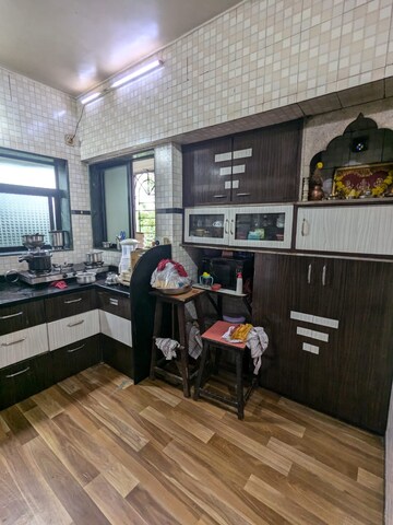 Kitchen in 1 BHK Apartment at Kharigaon – for Sale