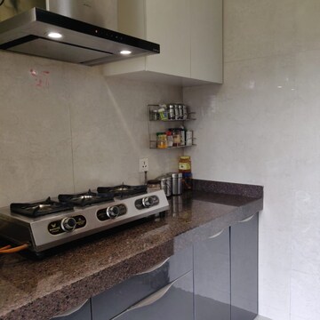 Kitchen in 2 BHK Apartment at Ashray Jaswanti Woods, Ghati Pada – for Sale