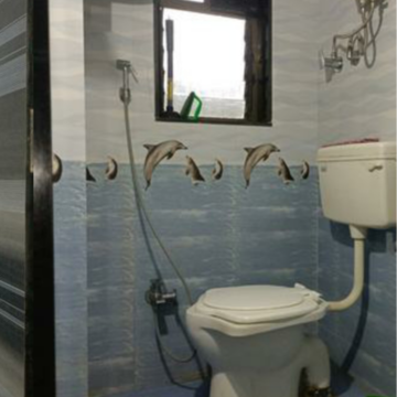Bathroom in 2 BHK Apartment at Ashray Jaswanti Woods, Ghati Pada – for Sale