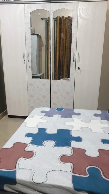 Master Bedroom in 2 BHK Apartment at Mohan Suburbia, Ambernath West – for Sale