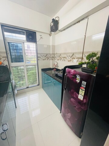 Kitchen in 1 BHK Apartment at Metro Giriraj Apartment, Mulund West – for Sale
