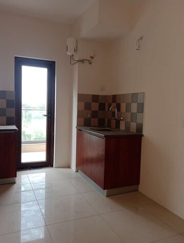 Kitchen in 4 BHK Apartment at Azeagaia Botanica, Vrindavan Yojna – for Sale