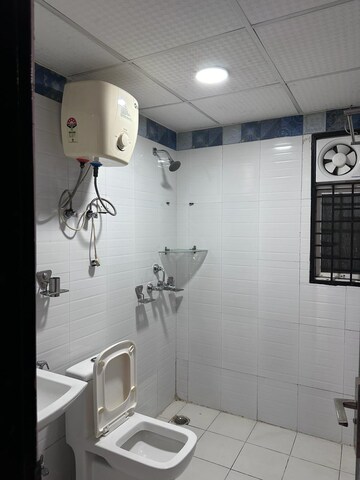 Bathroom in 2 BHK Apartment at Amrapali Princely Estate, Sector 76 – for Sale