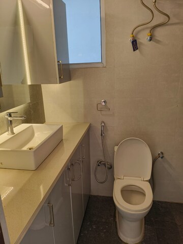Bathroom in 3 BHK Apartment at Tata Raheja Raisina Residency, Sector 59 – for Sale
