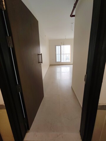 Building Lobby in 2 BHK Apartment at Dosti West County, Balkum Pada – for Sale