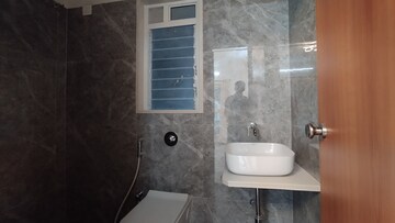 Bathroom in 2 BHK Apartment at Triveni Pearl, Khadakpada – for Sale