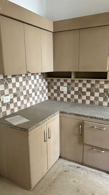 Kitchen in 2.5 BHK Apartment at Ajnara Le Garden, Sector 16b Greater Noida – for Sale