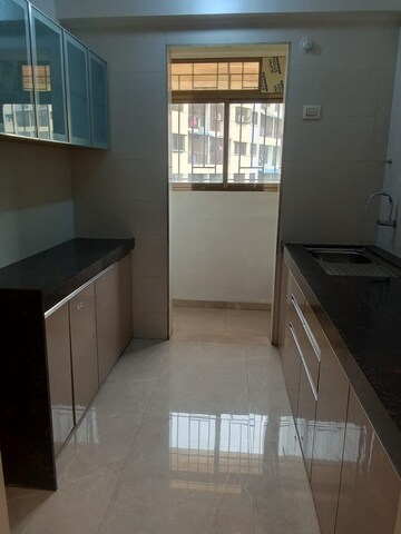Kitchen in 2 BHK Apartment at Shree Laxmi  Kailash Gardens, Yogidham – for Sale